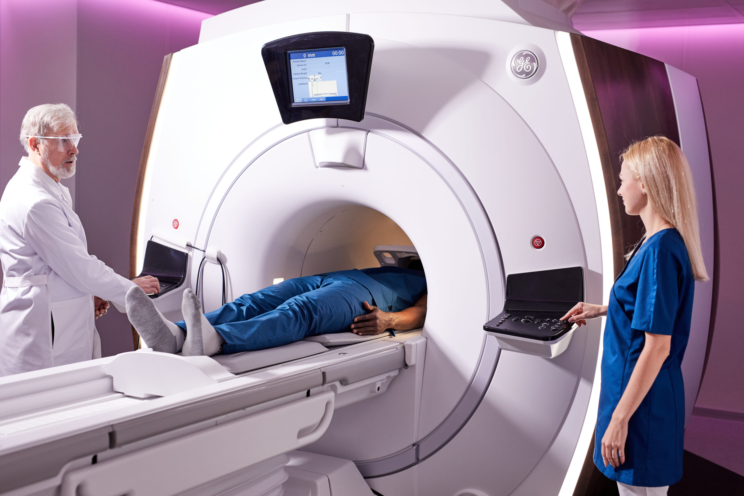 Medical,Technical,Assistant,Performing,Radiological,Scan,Of,Patient,With,Magnetic